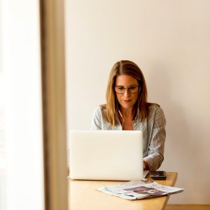 Blog 2 - Workplaces - Woman at Desk in Home or Office